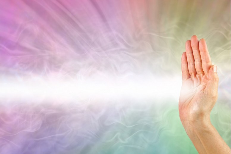 Hand met helend licht als beeld voor een sessie Aquarius Angels Healing Hand met helend licht als beeld voor een sessie Aquarius Angels Healing